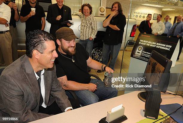 Of RAM Trucks Fred Diaz and Zac Brown of Zac Brown Band at the Ram Truck Brand Launch "Letters For Lyrics" at Ed Voyles Chrysler Jeep Dodge on May 7,...