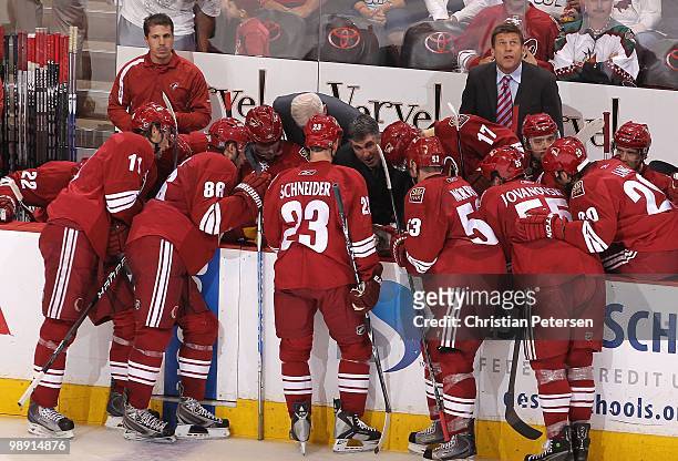 Head coach Dave Tippett of the Phoenix Coyotes coaches in Game Seven of the Western Conference Quarterfinals against the Detroit Red Wings during the...