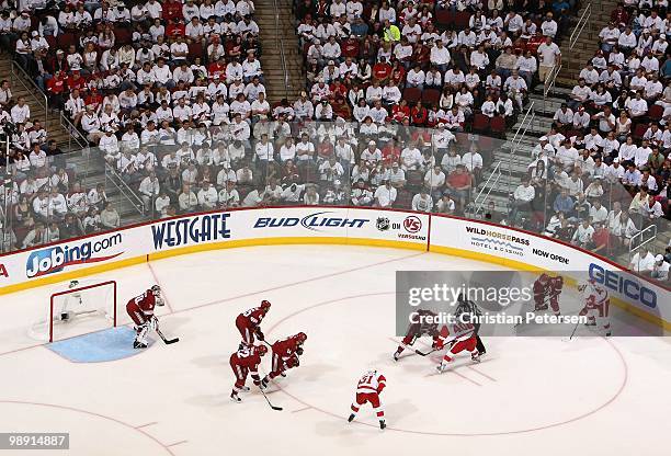 Henrik Zetterberg of the Detroit Red Wings takes a face off against the Phoenix Coyotes in Game Seven of the Western Conference Quarterfinals during...