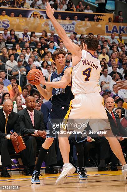 Kyle Korver of the Utah Jazz looks to move the ball against Luke Walton of the Los Angeles Lakers in Game One of the Western Conference Semifinals...