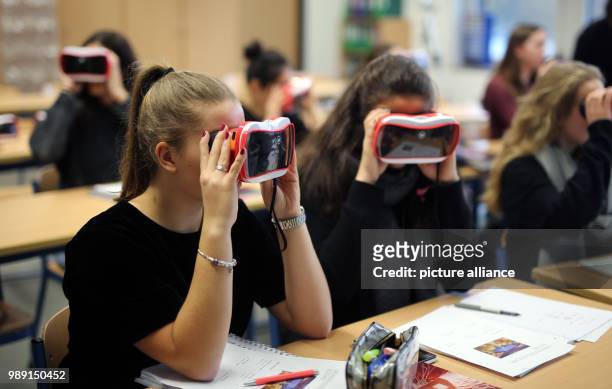 Students of the International School on the Rhine working with VR headsets on their digital lessons in Neuss, Germany, 15 December 2017. The school...