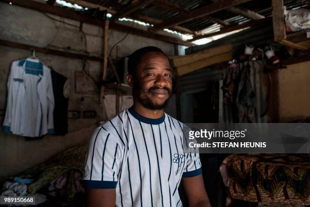 Nigerian actor Abiodun Kassim, poses on June 11 in Lagos. - Nigerian film director Ema Edosio greets people like a local in the working class Lagos...