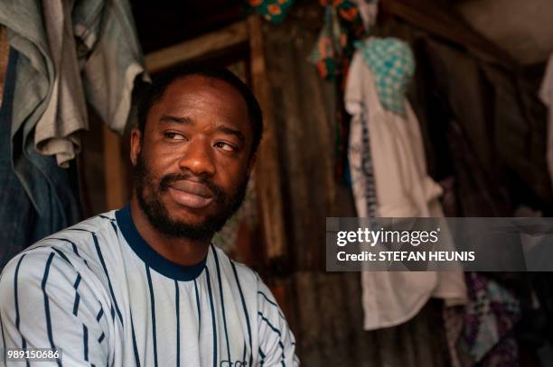 Nigerian actor Abiodun Kassim, poses on June 11 in Lagos. - Nigerian film director Ema Edosio greets people like a local in the working class Lagos...