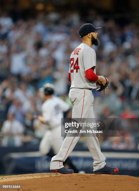 David Price of the Boston Red Sox looks on after surrendering a first inning home run against Aaron Judge of the New York Yankees at Yankee Stadium...