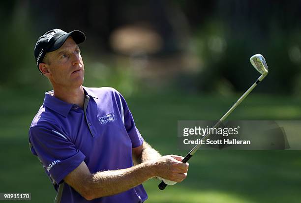 Jim Furyk watches his approach shot on the tenth hole during the second round of THE PLAYERS Championship held at THE PLAYERS Stadium course at TPC...