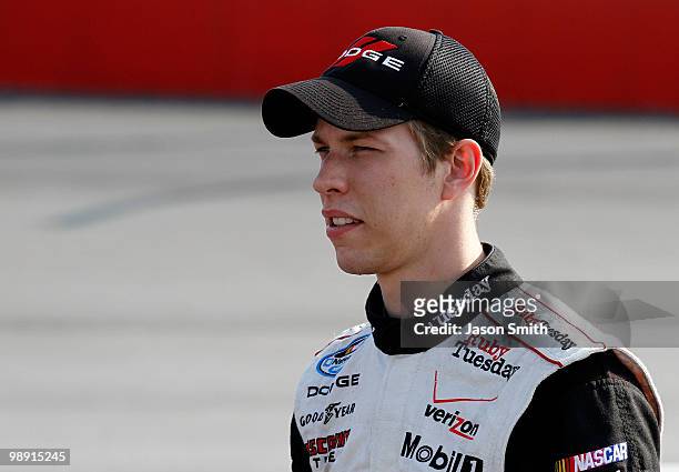 Brad Keselowski, driver of the Penske Dodge, looks on during qualifying for the NASCAR Sprint Cup series SHOWTIME Southern 500 at Darlington Raceway...