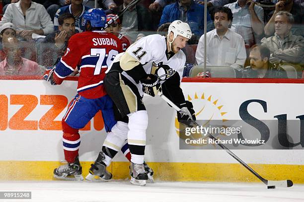 Jordan Staal of the Pittsburgh Penguins strips the puck from P.K. Subban of the Montreal Canadiens in Game Four of the Eastern Conference Semifinals...