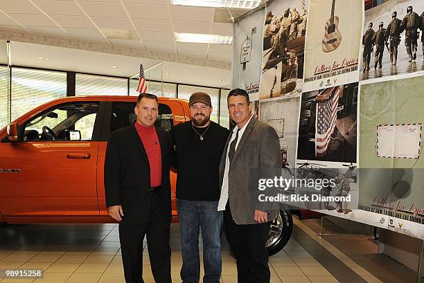 Drew Tutton GM Ed Voyles, Zac Brown of Zac Brown Band and CEO of RAM Trucks Fred Diaz at the Ram Truck Brand Launch "Letters For Lyrics" at Ed Voyles...