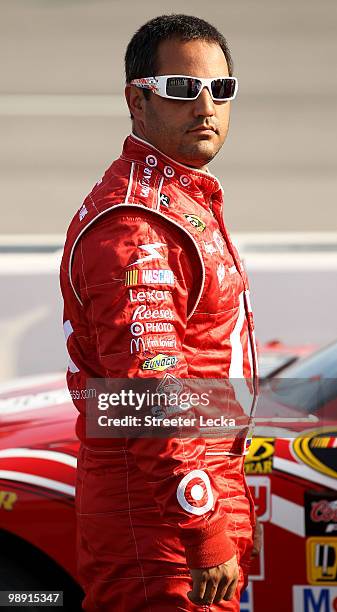 Juan Pablo Montoya, driver of the Target Chevrolet, stands on the grid during qualifying for the NASCAR Sprint Cup Series SHOWTIME Southern 500 at...