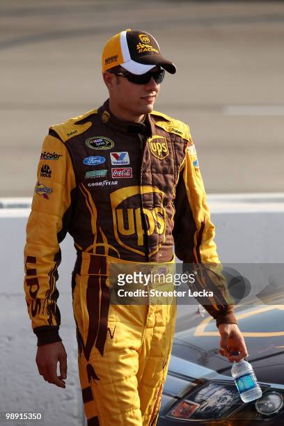 David Ragan, driver of the UPS Ford, walks on the grid during qualifying for the NASCAR Sprint Cup Series SHOWTIME Southern 500 at Darlington Raceway...