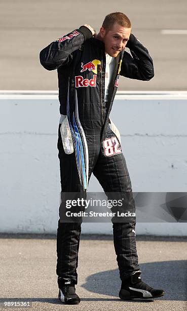 Scott Speed, driver of the Red Bull Toyota, stands on the grid during qualifying for the NASCAR Sprint Cup Series SHOWTIME Southern 500 at Darlington...