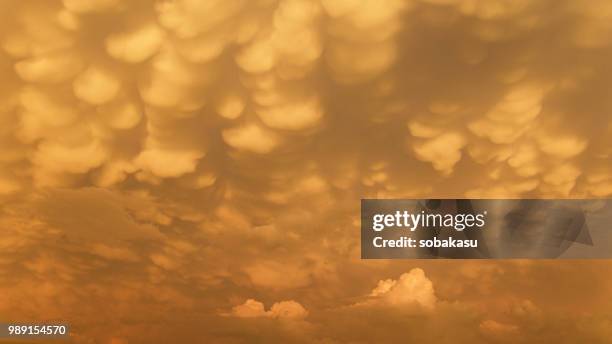 sunset storm - mammatus cloud stock pictures, royalty-free photos & images