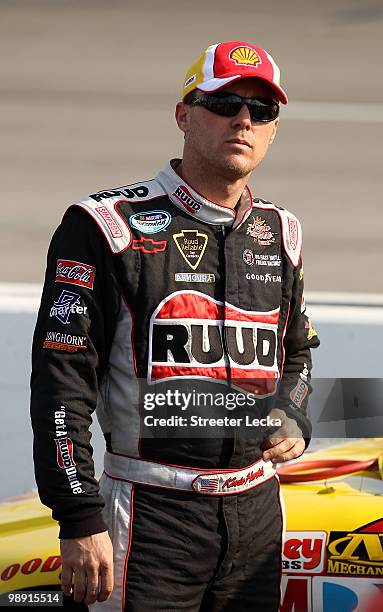 Kevin Harvick, driver of the Shell/Pennzoil Chevrolet, stands on the grid during qualifying for the NASCAR Sprint Cup Series SHOWTIME Southern 500 at...