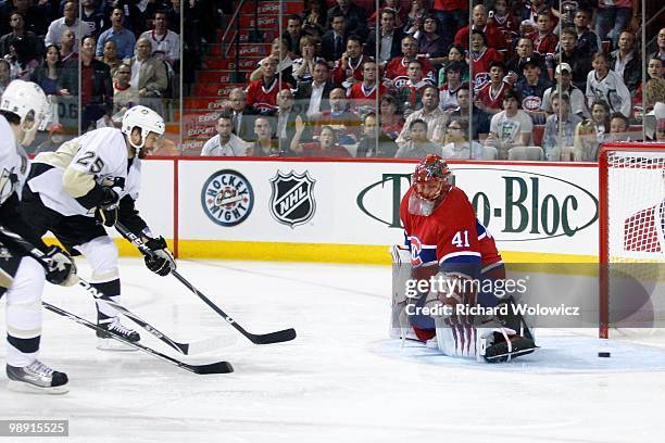 Maxime Talbot of the Pittsburgh Penguins scores a goal on Jaroslav Halak of the Montreal Canadiens in Game Four of the Eastern Conference Semifinals...