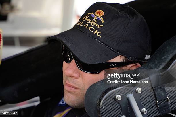 Matt Kenseth, driver of the Crown Royal Black Ford, sits in his car during qualifying for the NASCAR Sprint Cup Series SHOWTIME Southern 500 at...