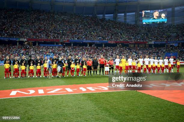 Players of Croatia and Denmark line up ahead of the 2018 FIFA World Cup Russia Round of 16 match between Croatia and Denmark at the Nizhny Novgorod...