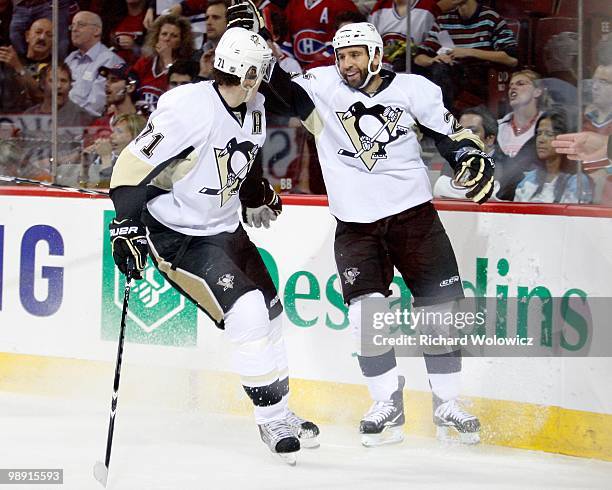 Maxime Talbot celebrates his first period goal with Evgeni Malkin of the Pittsburgh Penguins in Game Four of the Eastern Conference Semifinals...