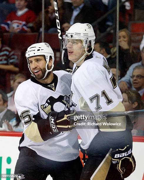 Maxime Talbot celebrates his first period goal with Evgeni Malkin of the Pittsburgh Penguins in Game Four of the Eastern Conference Semifinals...