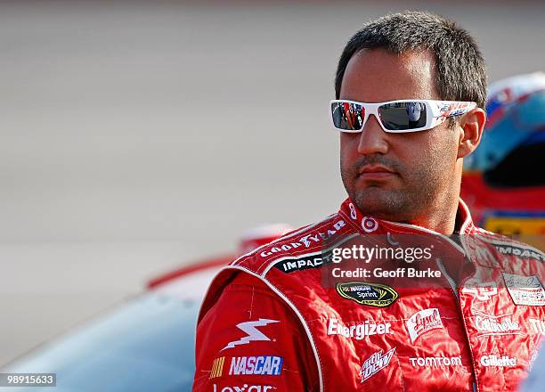 Juan Pablo Montoya, driver of the Target Chevrolet, stands on the grid during qualifying for the NASCAR Sprint Cup Series SHOWTIME Southern 500 at...