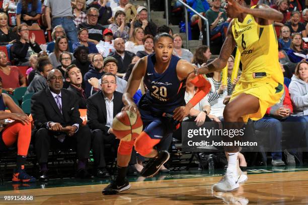 Alex Bentley of the Connecticut Sun handles the ball against the Seattle Storm on July 1, 2018 at Key Arena in Seattle, Washington. NOTE TO USER:...