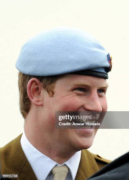 Prince Harry wears his Army Flying Corps blue beret following his pilot course graduation at the Army Aviation Centre on May 7, 2010 in Andover,...