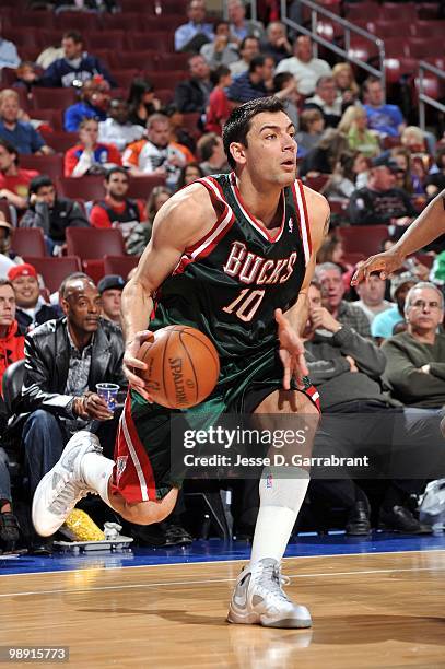 Carlos Delfino of the Milwaukee Bucks drives the ball against the Philadelphia 76ers during the game at Wachovia Center on April 9, 2010 in...