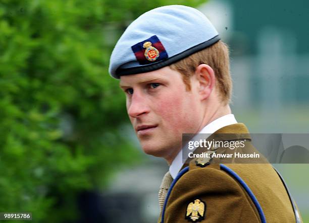 Prince Harry wears his Army Flying Corps blue beret following his pilot course graduation at the Army Aviation Centre on May 7, 2010 in Andover,...