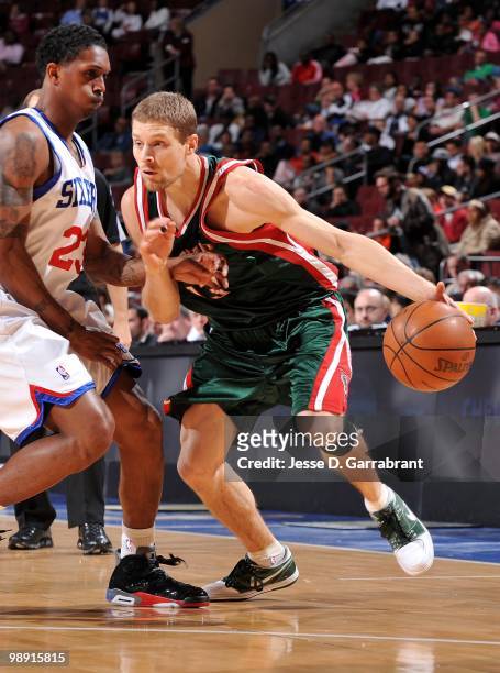 Luke Ridnour of the Milwaukee Bucks drives the ball against the Philadelphia 76ers during the game at Wachovia Center on April 9, 2010 in...