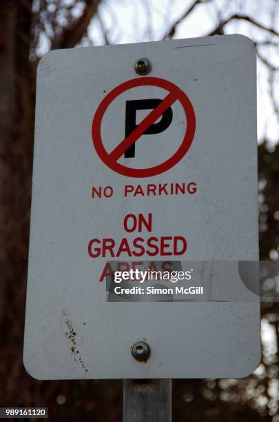 'no parking on grassed areas' sign - keep off the grass sign stock pictures, royalty-free photos & images
