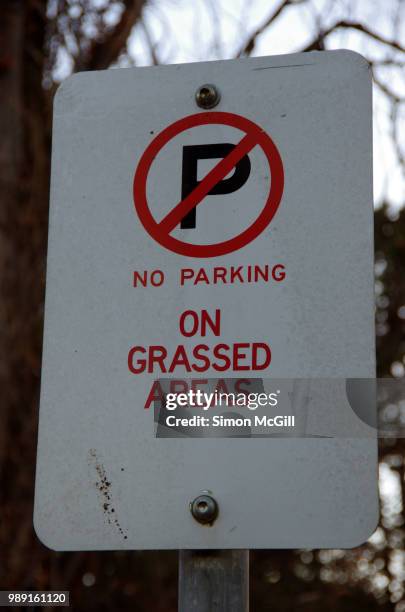 'no parking on grassed areas' sign - keep off lawn sign stock pictures, royalty-free photos & images