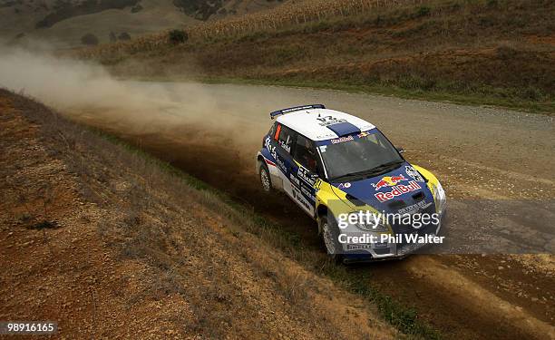 Patrik Sandell and co-driver Emil Axelson of Sweden drive their Skoda Fabia S2000 during stage 12 of the WRC Rally of New Zealand on the Te Akau...