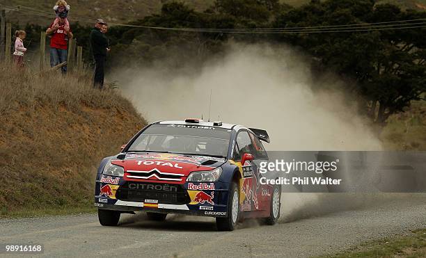 Dani Sordo and co-driver Marc Marti of Spain drive their Citroen C4 WRC during stage 12 of the WRC Rally of New Zealand on the Te Akau Coast on May...