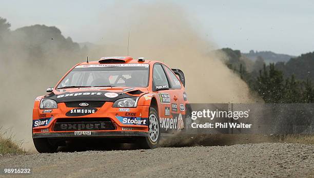 Henning Solberg of Norway and co-drivern Ilka Minor drive their Ford Focus RS WRC during stage 10 of the WRC Rally of New Zealand at Glen Murray on...