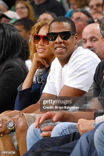 Singer Beyonce and Rapper Jay-Z watch the game between the Boston Celtics and the Cleveland Cavaliers in Game Three of the Eastern Conference...