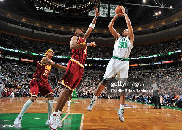 Rasheed Wallace of the Boston Celtics takes the shot against Antawn Jamison of the Cleveland Cavaliers in Game Three of the Eastern Conference...