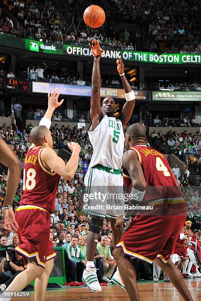 Kevin Garnett of the Boston Celtics takes the shot against Antawn Jamison of the Cleveland Cavaliers in Game Three of the Eastern Conference...