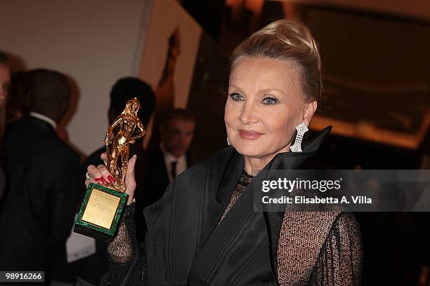 Barbara Bouchet receives the 'David Di Donatello' for Best Foreign Movie for 'Inglorious Bastards' during the Italian Movie Awards ceremony on May 7,...