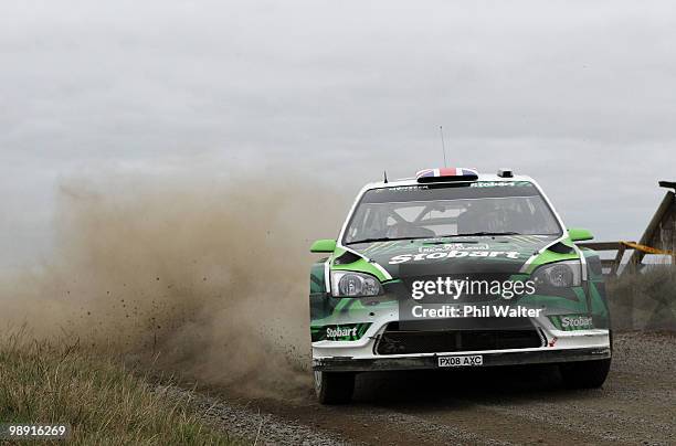 Matthew Wilson and co-driver Scott Martin of Great Britain drive their Ford Focus RS WRC during stage 10 of the WRC Rally of New Zealand at Glen...