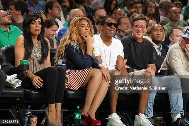 Rapper Jay-Z and singer Beyonce Knowles watch as the Cleveland Cavaliers take on the Boston Celtics in Game Three of the Eastern Conference...