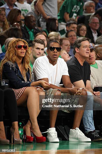 Rapper Jay-Z and singer Beyonce Knowles watch as the Cleveland Cavaliers take on the Boston Celtics in Game Three of the Eastern Conference...