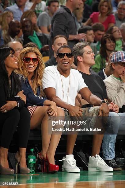 Rapper Jay-Z and singer Beyonce Knowles watch as the Cleveland Cavaliers take on the Boston Celtics in Game Three of the Eastern Conference...