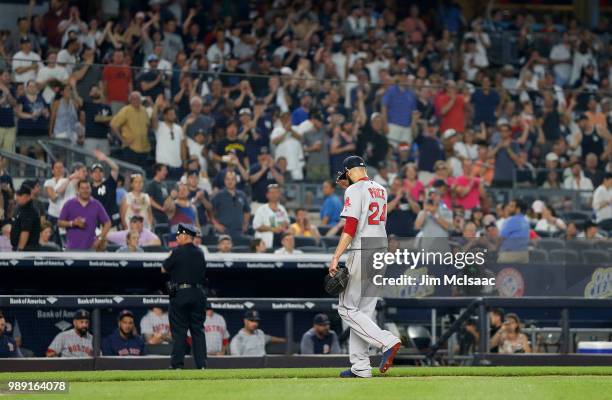 David Price of the Boston Red Sox walks to the dugout after he was removed from a game against the Boston Red Sox in the fourth inning at Yankee...