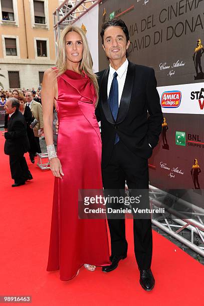 Tiziana Rocca and Giulio Base attend the 'David Di Donatello' movie awards at the Auditorium Conciliazione on May 7, 2010 in Rome, Italy.