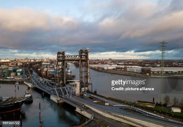 Cars drive across the Rethe bascule bridge in Hamburg, Germany, 16 December 2017. On 15 December 2016 the Hamburg port authority HPA opened the Rethe...