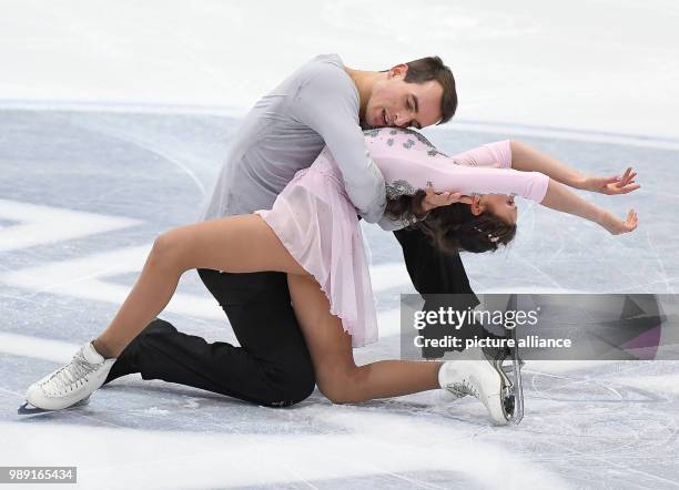 Annika Hocke and Ruben Blommaert in action during the Pair's event of the German Figure Skating Championships taking place in the Eissporthalle...