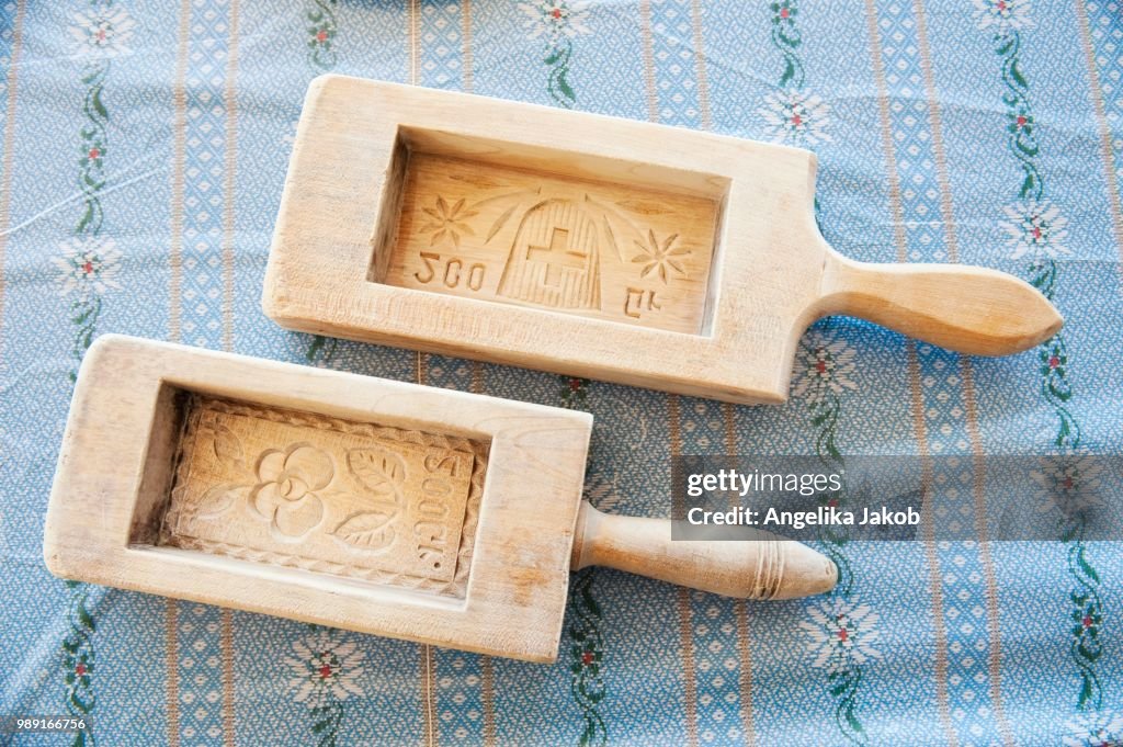 Two wooden butter moulds with carvings, Switzerland