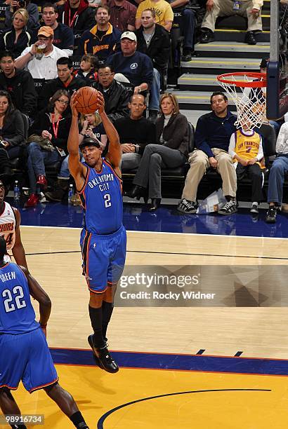 Thabo Sefolosha of the Oklahoma City Thunder rebounds during the game against the Golden State Warriors at Oracle Arena on April 11, 2010 in Oakland,...