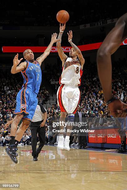 Monta Ellis of the Golden State Warriors shoots a jump shot against Eric Maynor of the Oklahoma City Thunder during the game at Oracle Arena on April...