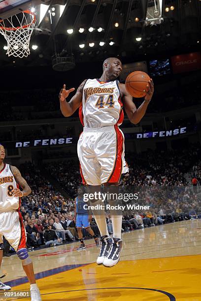 Anthony Tolliver of the Golden State Warriors rebounds during the game against the Oklahoma City Thunder at Oracle Arena on April 11, 2010 in...