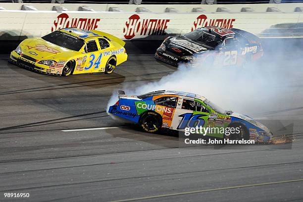 Matt Kenseth, driver of the Coupons.com Ford spins out during the NASCAR Nationwide series Royal Purple 200 presented by O'Reilly Auto Parts at...